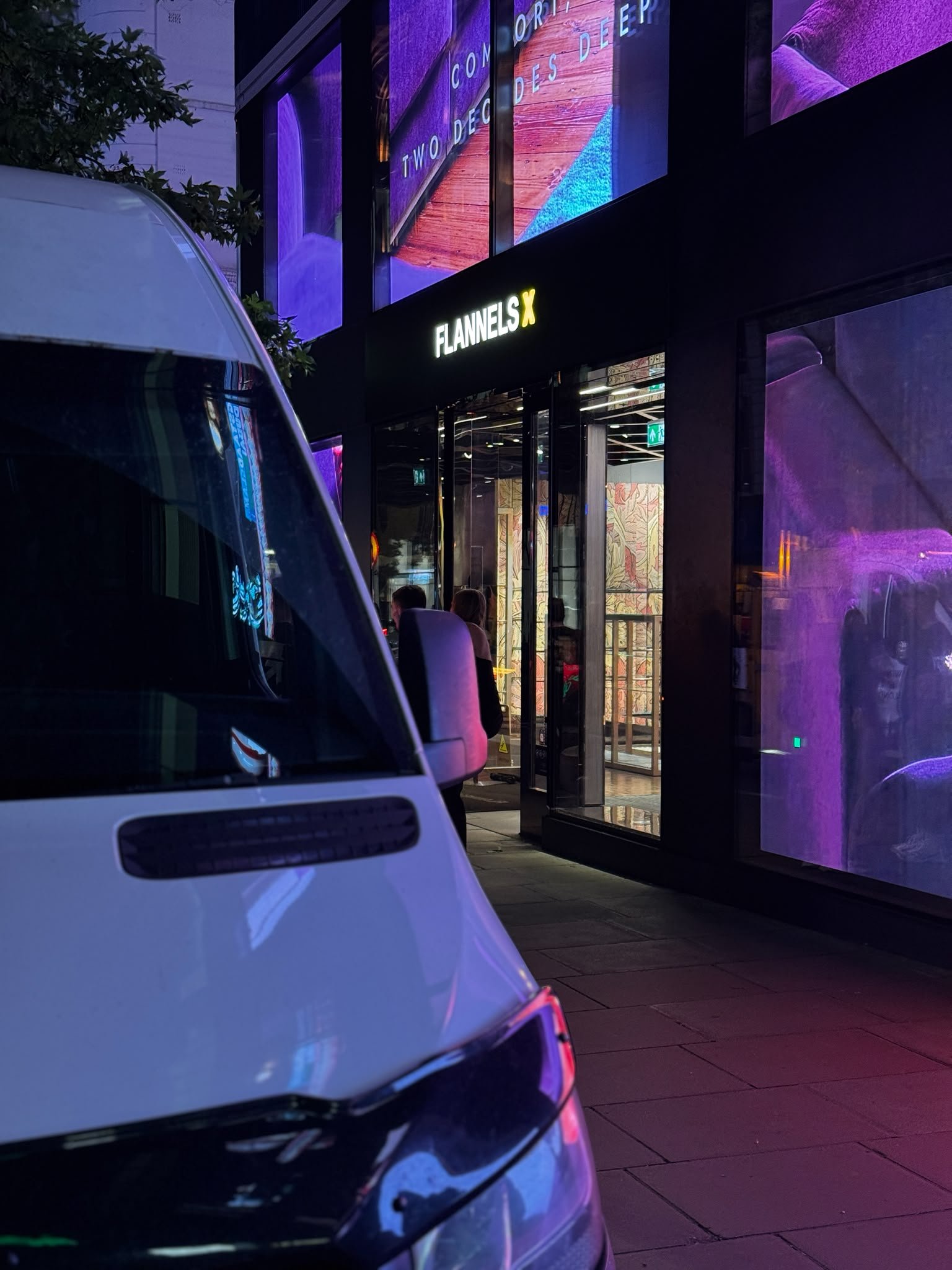 Installation crew at Flannels flagship store, Oxford Street